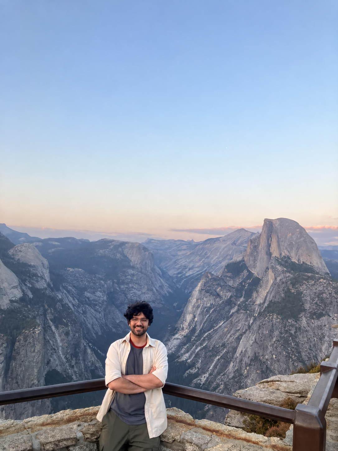 Saurabh standing at a mountain overlook
